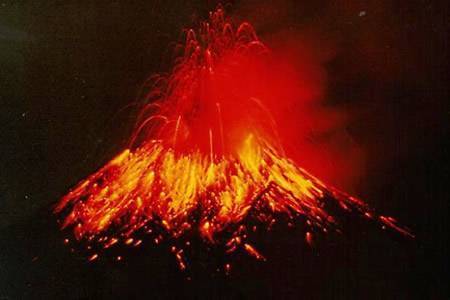 powerful volcanic eruption with glowing lava and ash illuminated against a night sky.