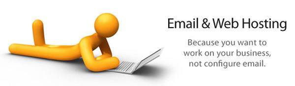 Cartoon figure using a laptop, promoting simplified email and web hosting for business efficiency.