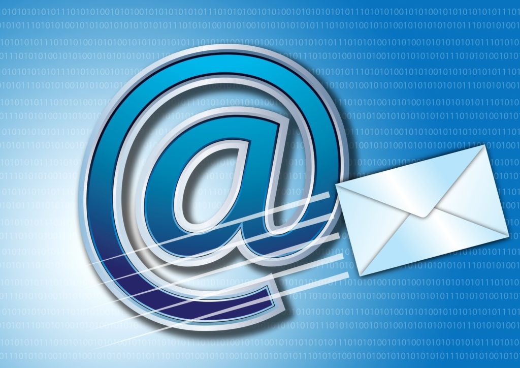 modern design of email communication with @ symbol and envelope icon on a blue background.