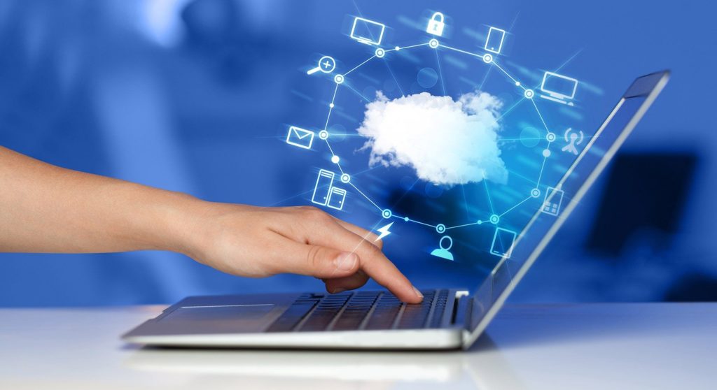 modern laptop with cloud icons illustrating connectivity and efficiency in business technology solutions.