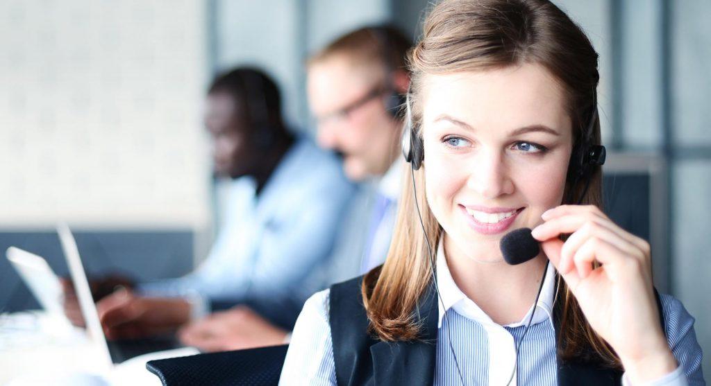 professional woman in a headset exemplifies teamwork and technology in customer service.