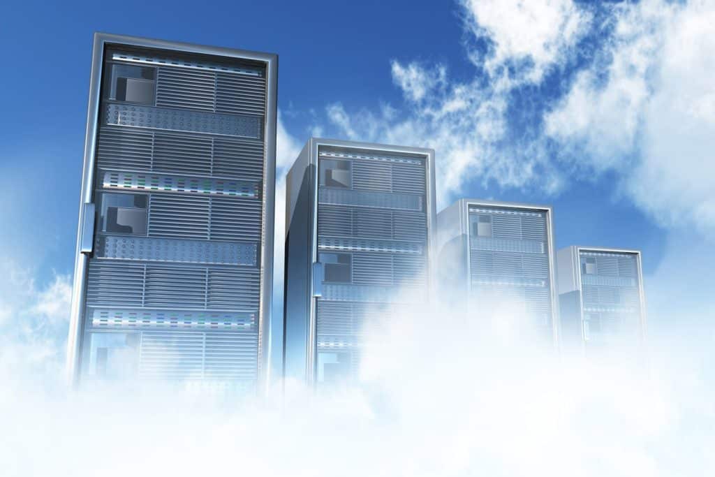 Modern server towers emerging from clouds, symbolizing the future of cloud computing and technology.