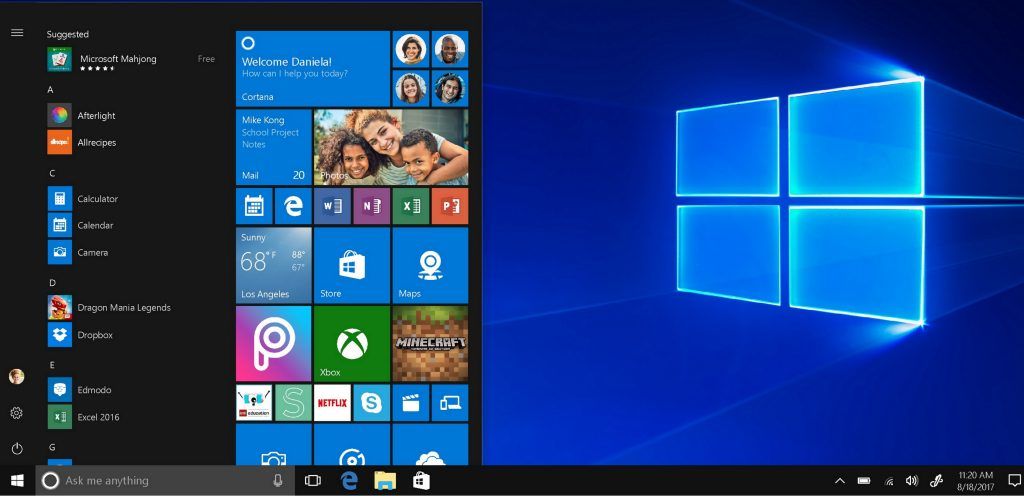 windows 10 desktop featuring a customizable start menu with colorful tiles and taskbar icons.