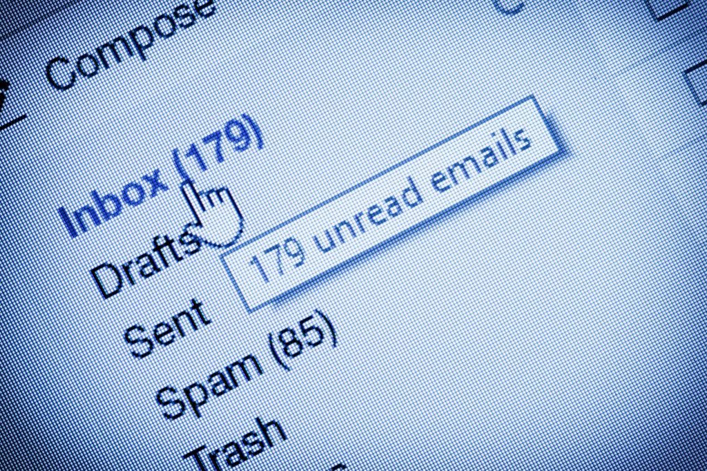 close-up of an email inbox with 179 unread messages and organized folder options.