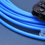 a close up of a blue cable and a black cable